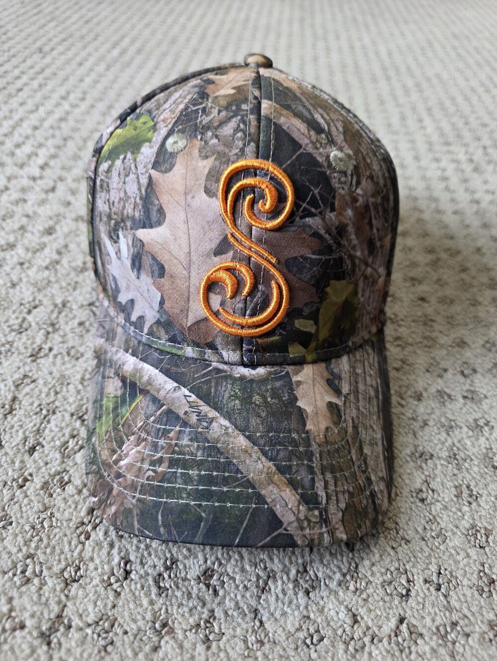 She Outdoor Apparel Camo Cap with Orange 'S' Accent